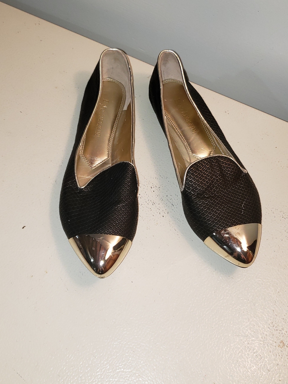 Enzo Angiolini Black Pointed Flats with Gold Toe Caps